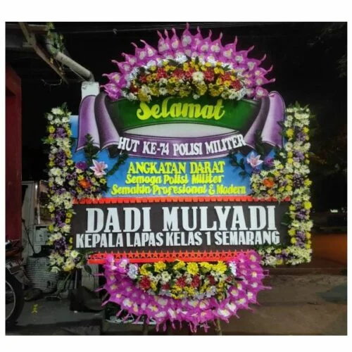 Bunga papan ucapan selamat dan sukses